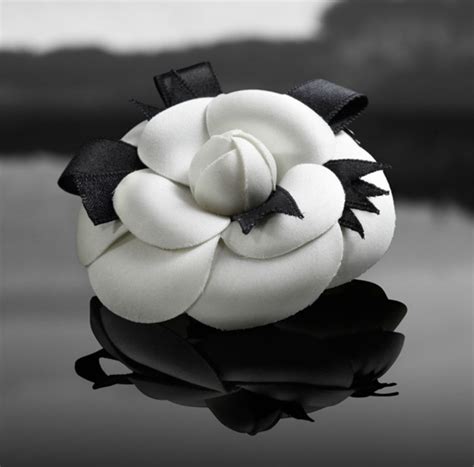 chanel camellia brooch outfit